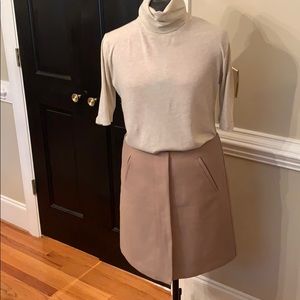 Benetton mini skirt, 19in long, beige.